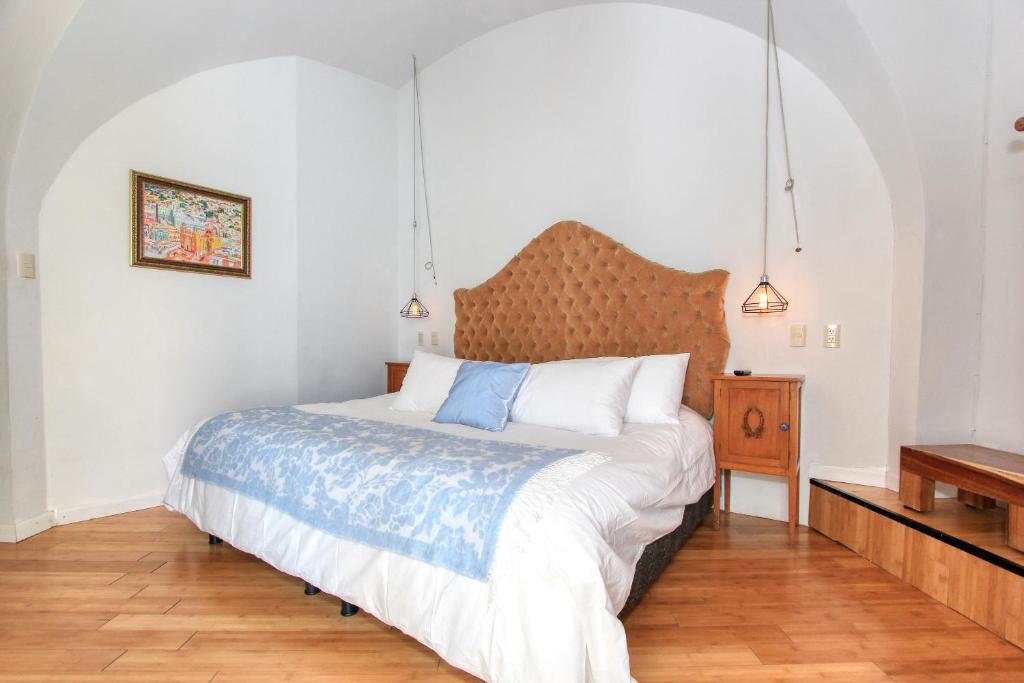 Postel nebo postele na pokoji v ubytování Hotel Mansion Von Humboldt