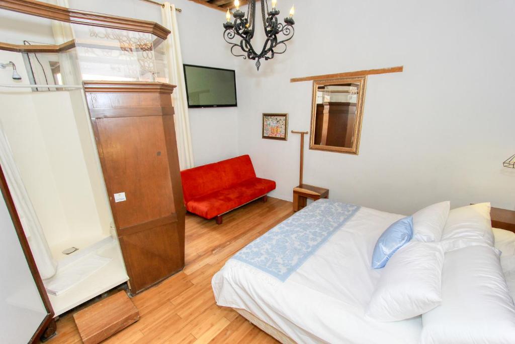 Postel nebo postele na pokoji v ubytování Hotel Mansion Von Humboldt