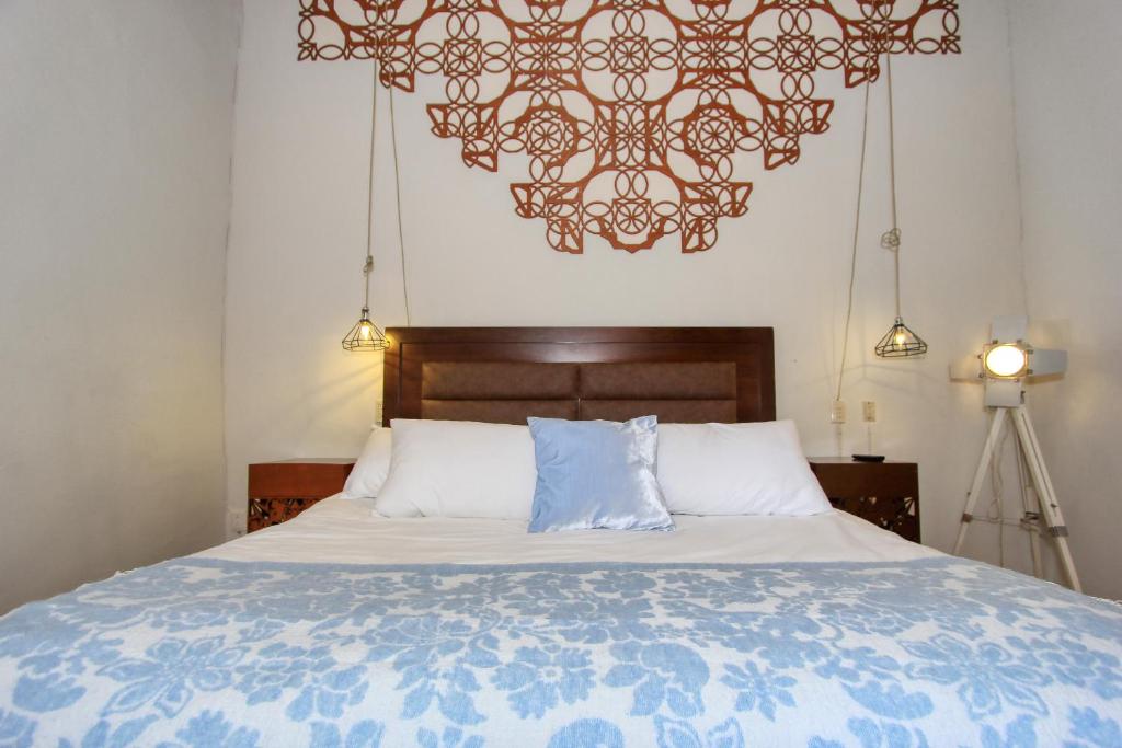 Postel nebo postele na pokoji v ubytování Hotel Mansion Von Humboldt