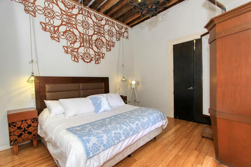 Postel nebo postele na pokoji v ubytování Hotel Mansion Von Humboldt