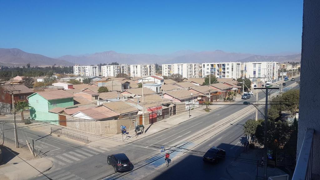 an aerial view of a city with buildings and a street at Atacama Valley 5 in Copiapó