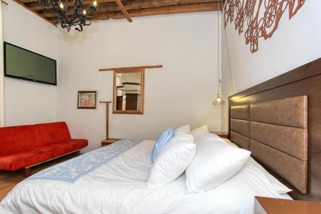 Postel nebo postele na pokoji v ubytování Hotel Mansion Von Humboldt