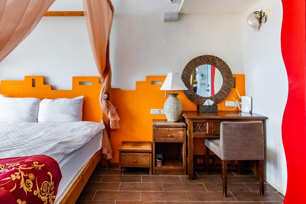 Postel nebo postele na pokoji v ubytování Fei Li Jin Hotel