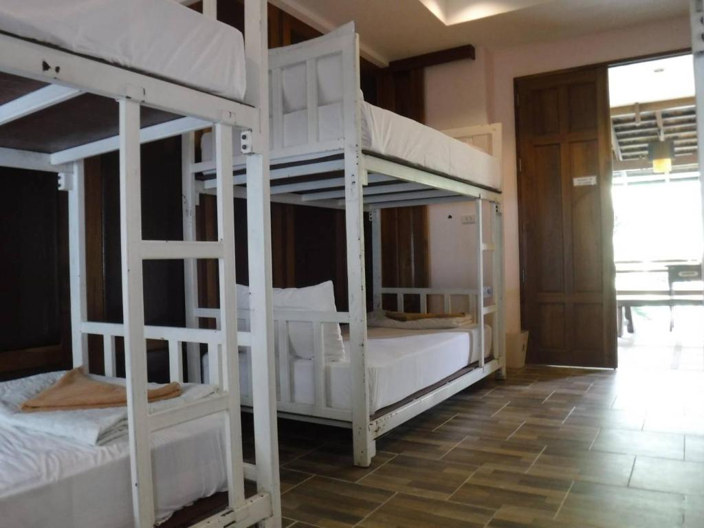 Postel nebo postele na pokoji v ubytování Seashell Resort Hostel Koh Tao