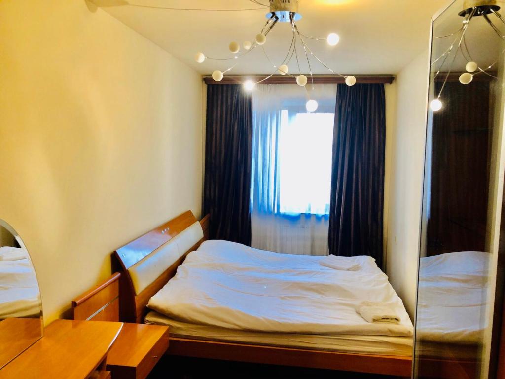 Postel nebo postele na pokoji v ubytování Center Hostel and Tours