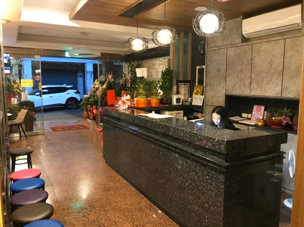 Kuchyň nebo kuchyňský kout v ubytování 金城Aimei商務旅館