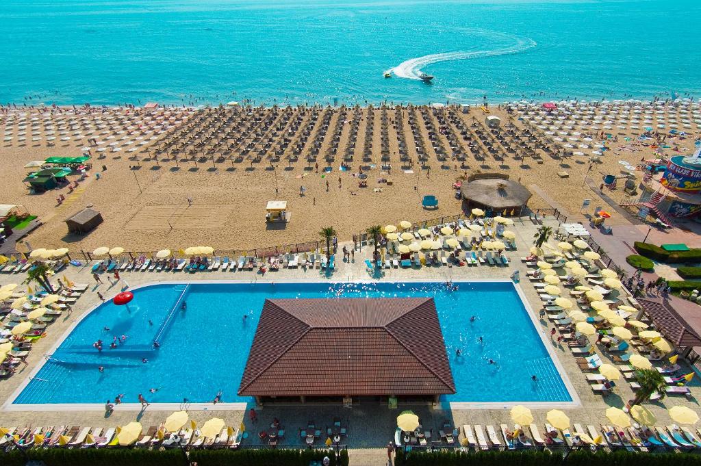 an overhead view of a swimming pool and a beach at Admiral Hotel - Ultra All Inclusive & Private Beach in Golden Sands
