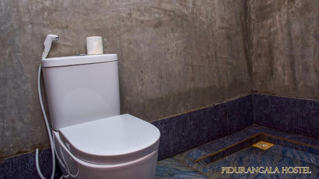 Koupelna v ubytování Pidurangala Hostel