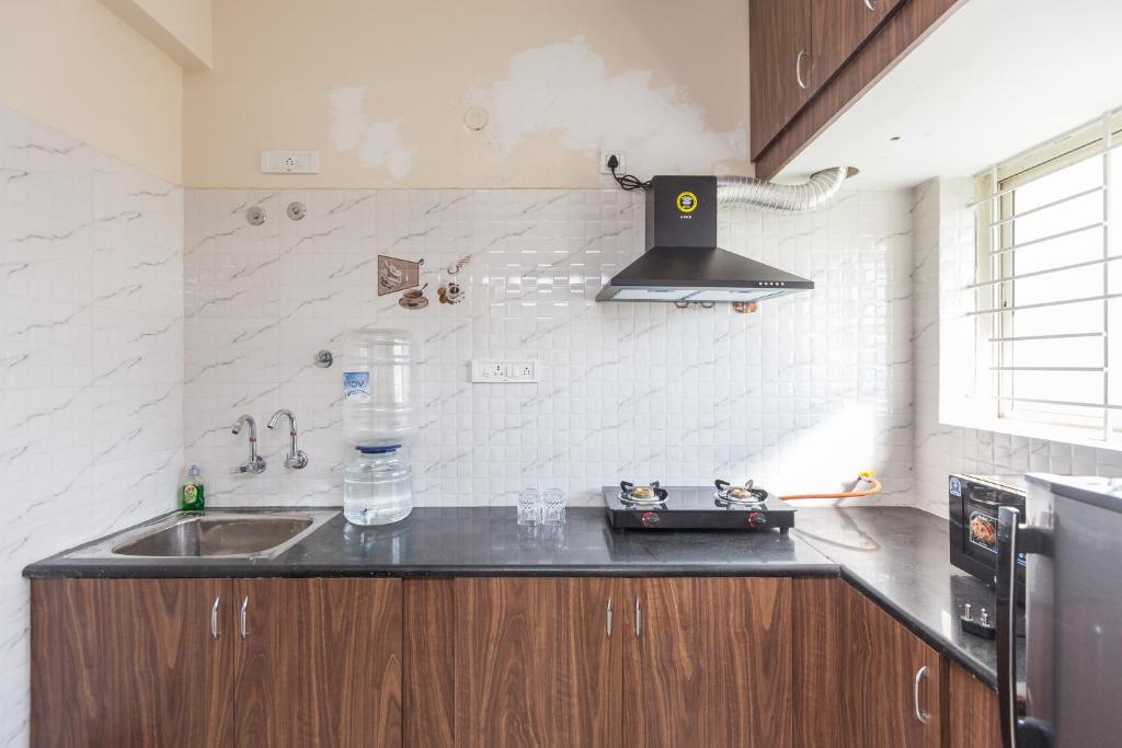 Kuchyň nebo kuchyňský kout v ubytování Misty Meridian Serviced Apartments