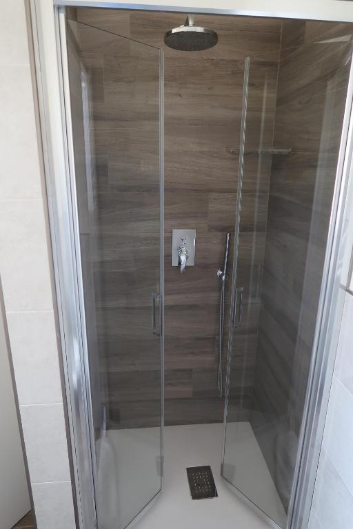 Koupelna v ubytování Hotel Riposo