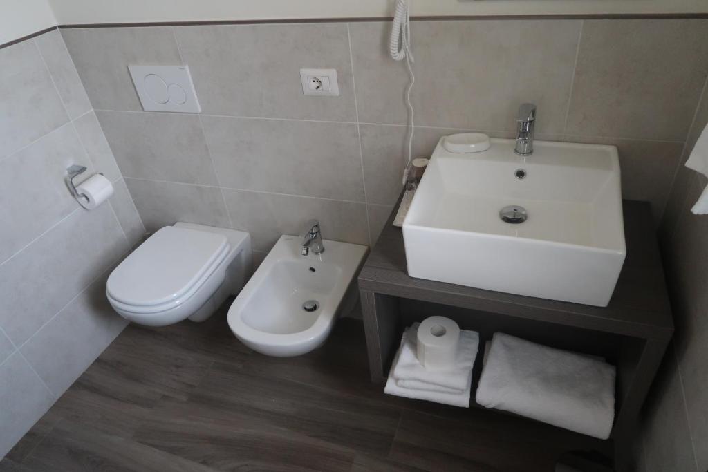 Koupelna v ubytování Hotel Riposo