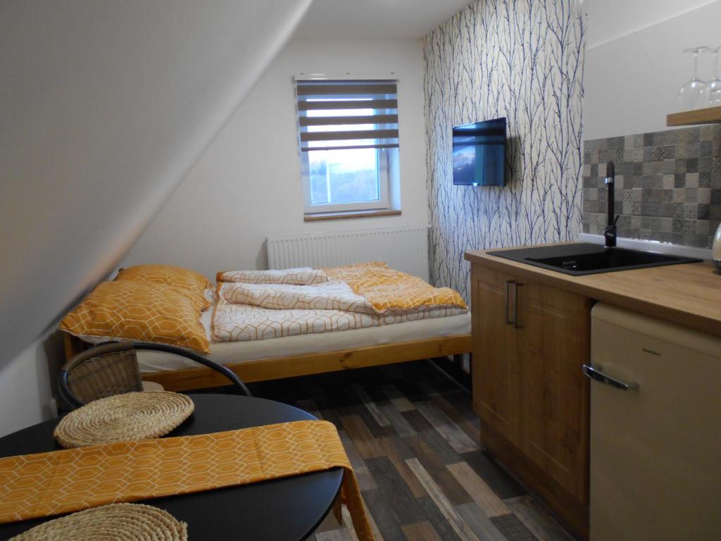 Postel nebo postele na pokoji v ubytování Apartmány Brychovi