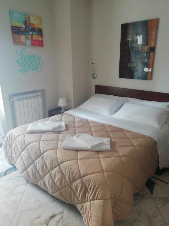 Posteľ alebo postele v izbe v ubytovaní B&B Le Vie D'Arte
