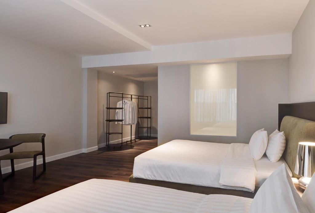 Postel nebo postele na pokoji v ubytování S Ram Leisure Hotel SHA PLUS