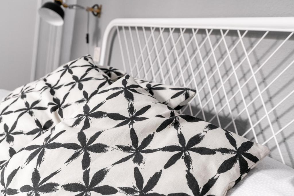 A bed or beds in a room at SVL - Sunny and bright apartment at historical Center