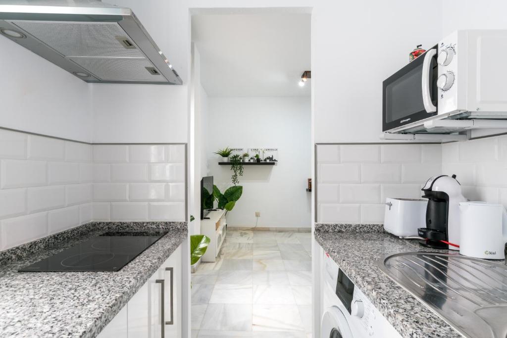 A kitchen or kitchenette at SVL - Sunny and bright apartment at historical Center