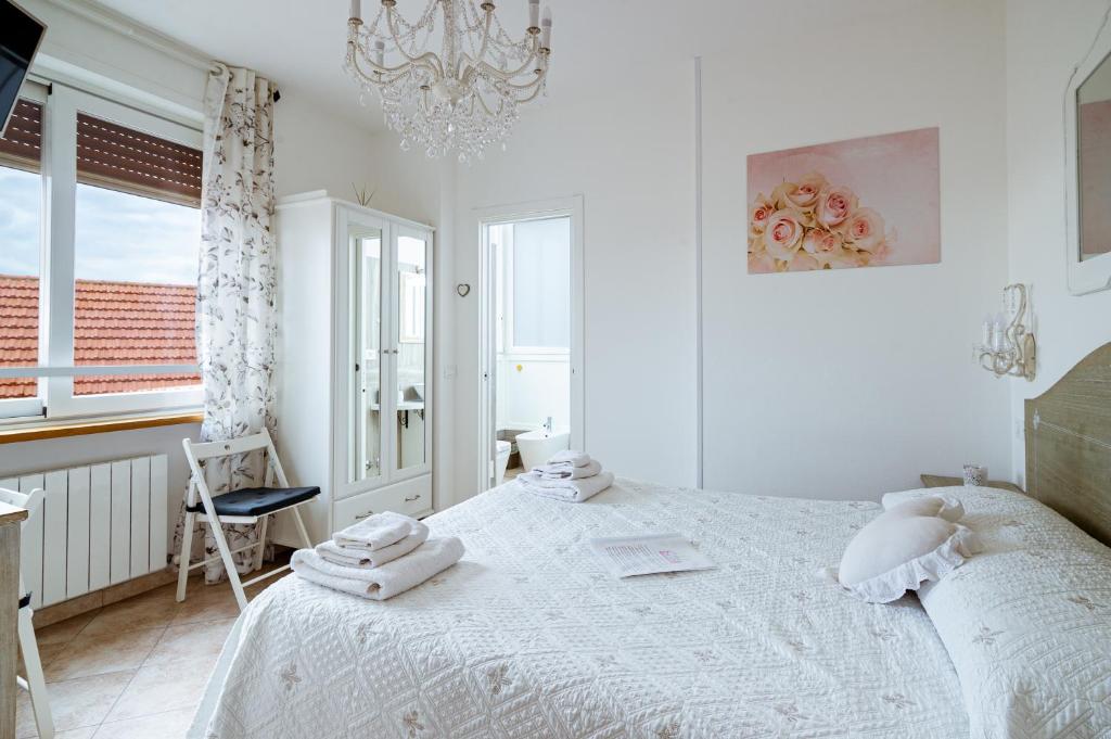 Posteľ alebo postele v izbe v ubytovaní "6 in centro" guest house