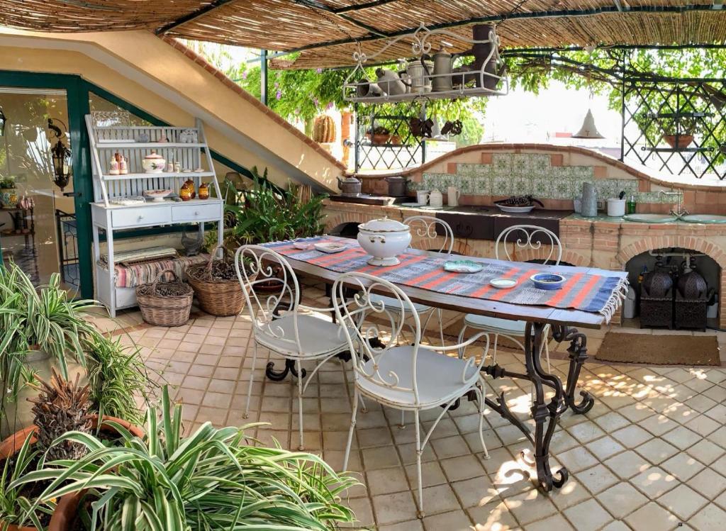 Reštaurácia alebo iné gastronomické zariadenie v ubytovaní Terrazza Pavone