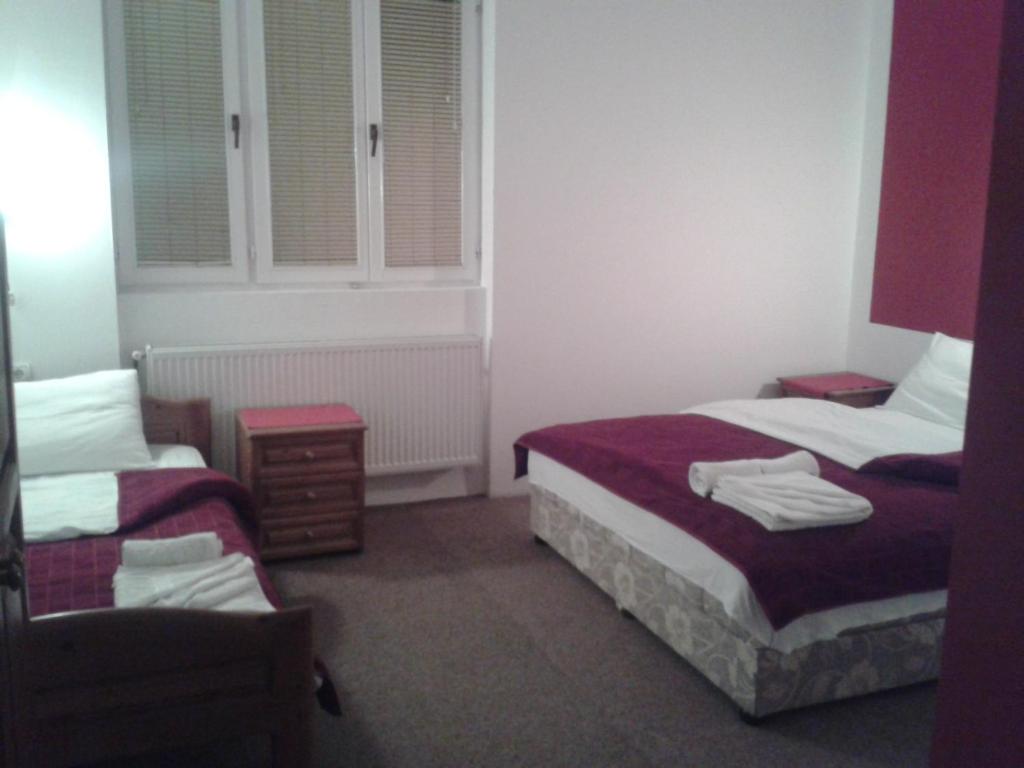 Postel nebo postele na pokoji v ubytování Rooms Lisičić