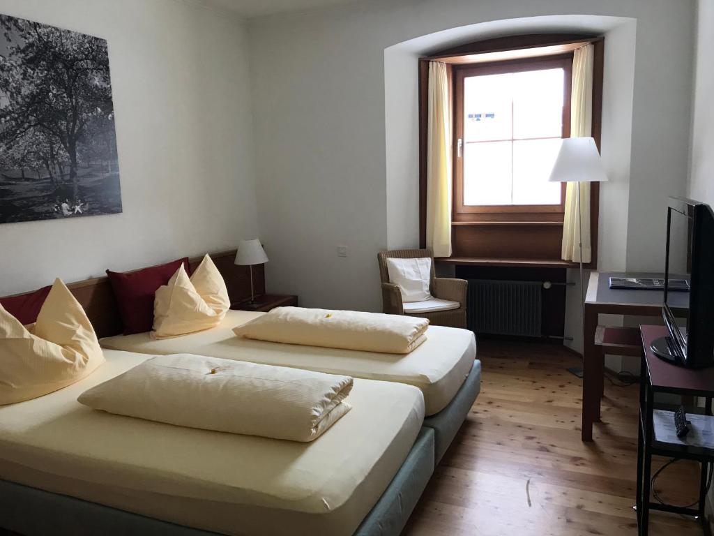 Postel nebo postele na pokoji v ubytování Hôtel Bodenhaus