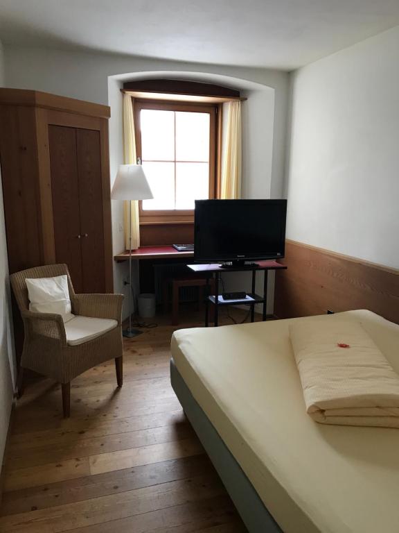 TV a/nebo společenská místnost v ubytování Hôtel Bodenhaus