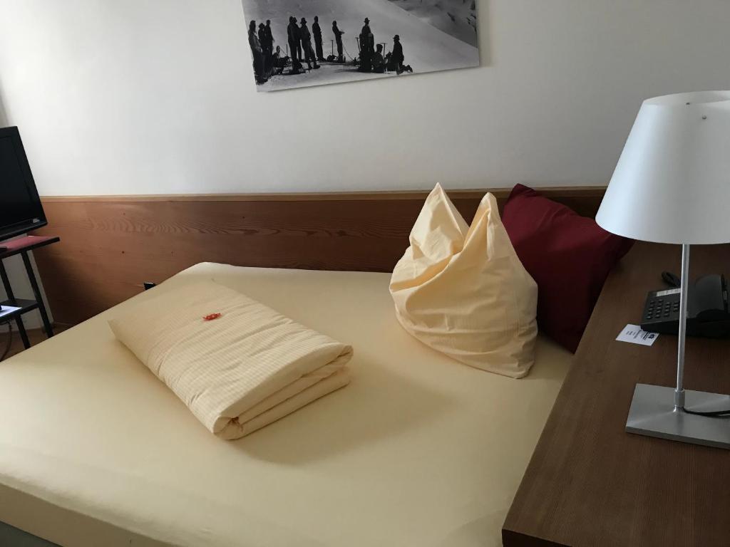 Postel nebo postele na pokoji v ubytování Hôtel Bodenhaus