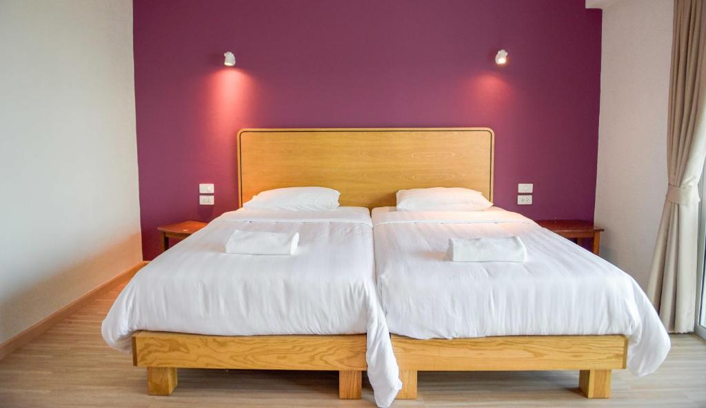 Postel nebo postele na pokoji v ubytování Seaman Resort