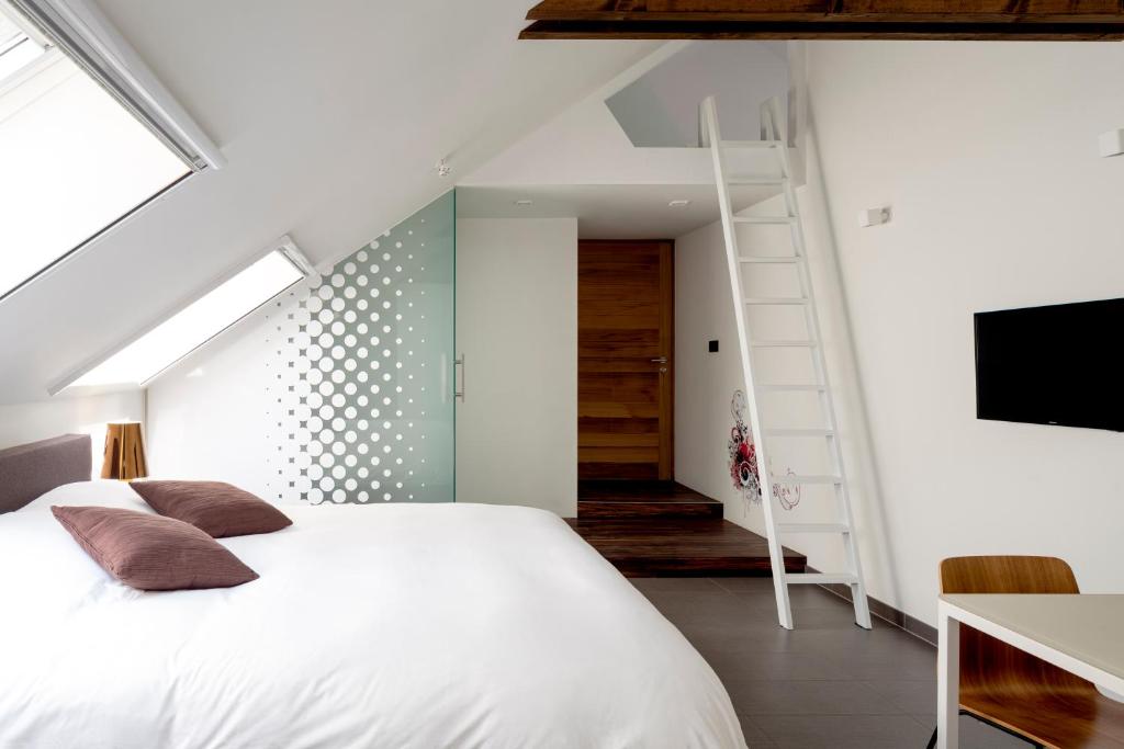Postel nebo postele na pokoji v ubytování B&B Bed and Beyond