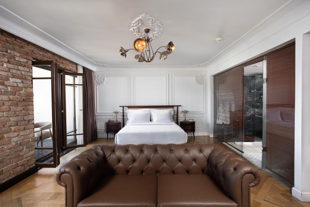Postel nebo postele na pokoji v ubytování Georges Hotel Galata