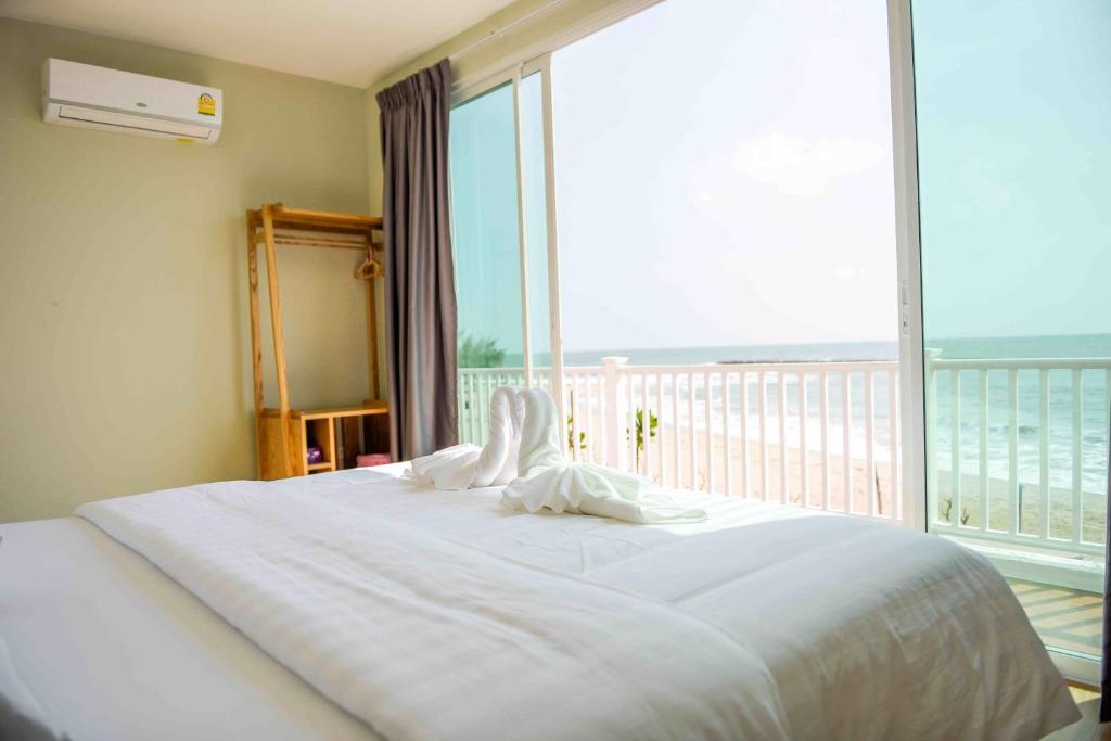 Postel nebo postele na pokoji v ubytování Seaman Resort
