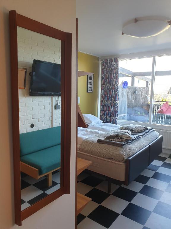 Postel nebo postele na pokoji v ubytování Hotell Hanöbris på Kivik