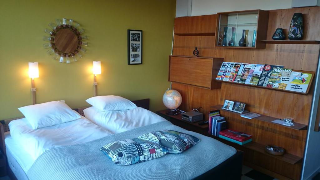 Postel nebo postele na pokoji v ubytování Hotell Hanöbris på Kivik