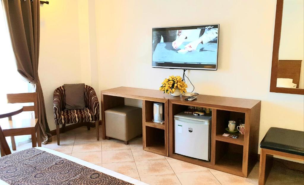 TV a/nebo společenská místnost v ubytování The Pub Hotel