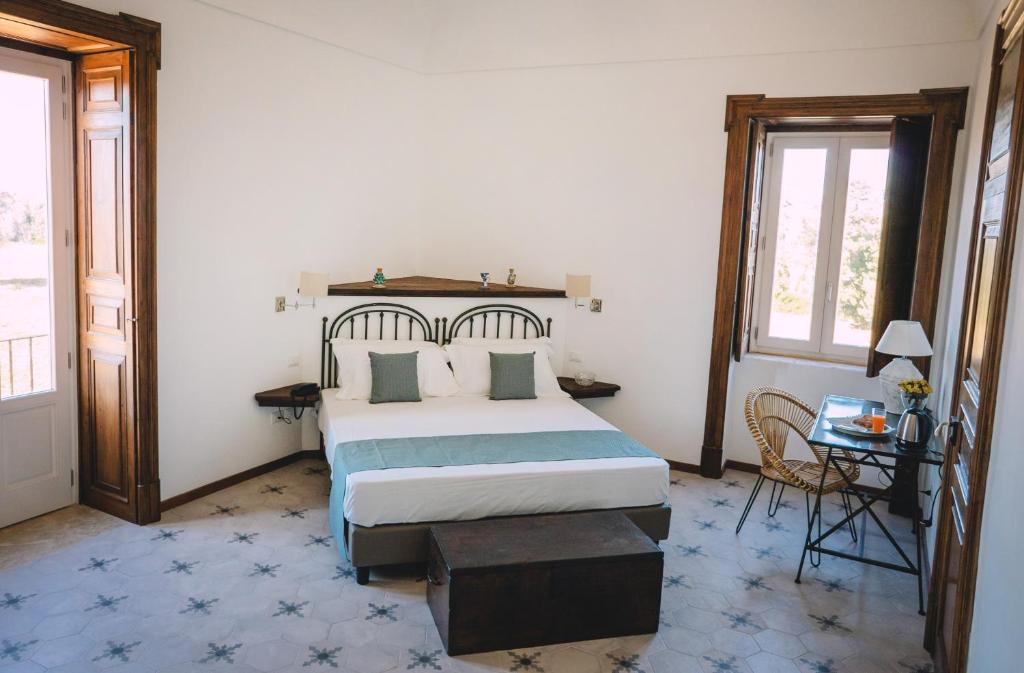 Postel nebo postele na pokoji v ubytování Masseria Testaferrata