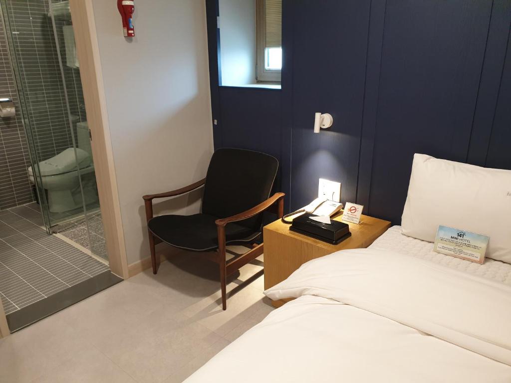 Postel nebo postele na pokoji v ubytování Mini Hotel 141