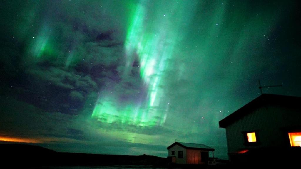 an image of the northern lights in the sky at Hekla Cabin 3 Volcano and Glacier View in Hella