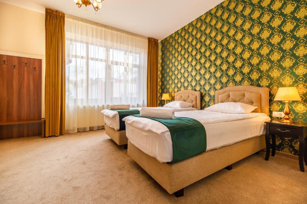 Postel nebo postele na pokoji v ubytování Casa Moritz
