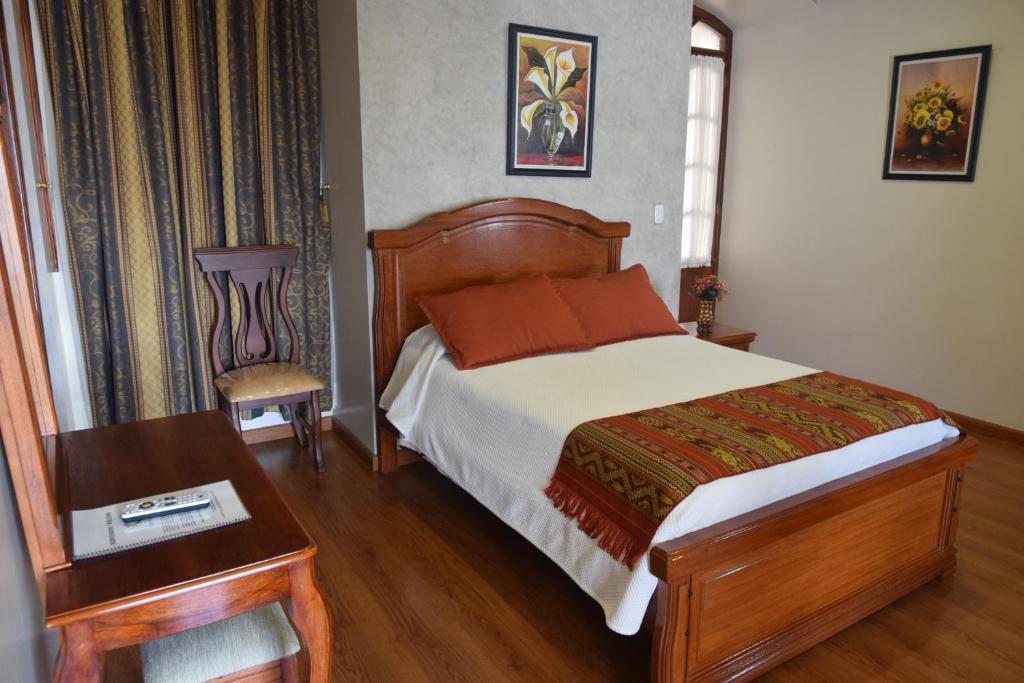 Postel nebo postele na pokoji v ubytování Hotel Casa Montero