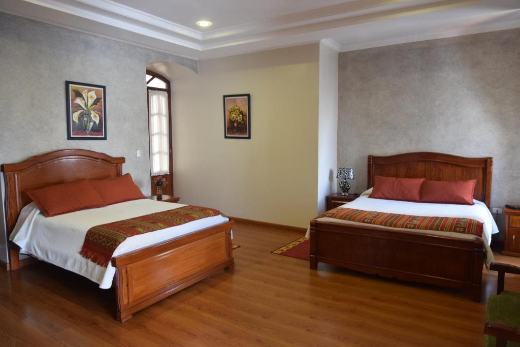 Postel nebo postele na pokoji v ubytování Hotel Casa Montero