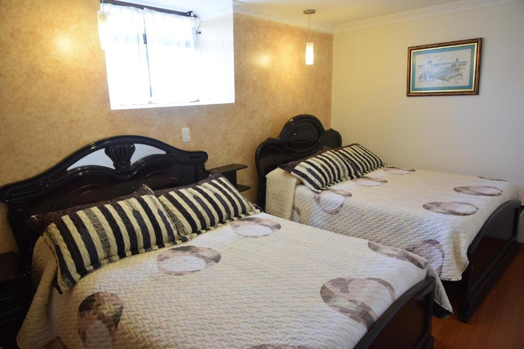 Postel nebo postele na pokoji v ubytování Hotel Casa Montero