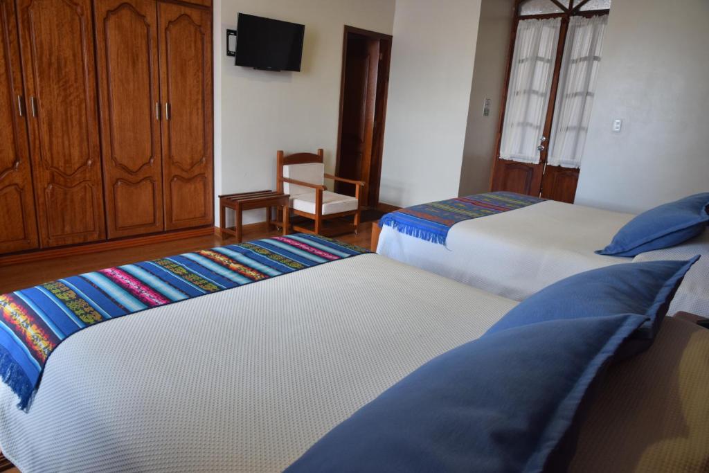 Postel nebo postele na pokoji v ubytování Hotel Casa Montero