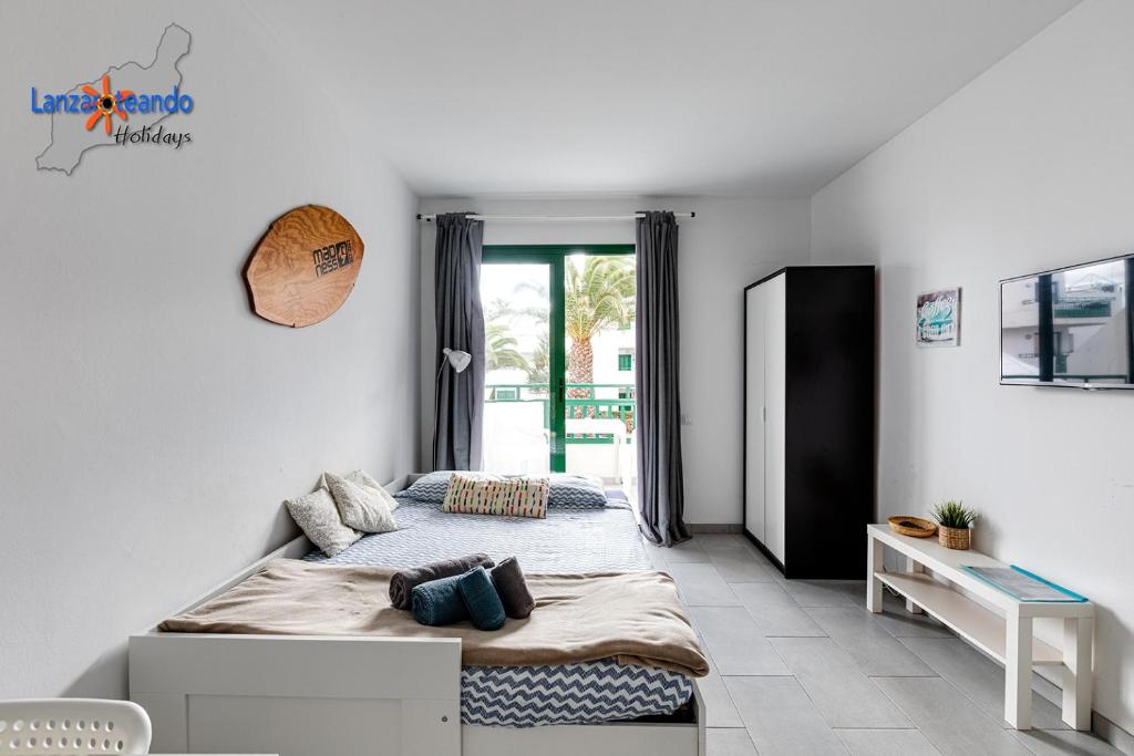 Postel nebo postele na pokoji v ubytování Vivienda Vacacional Buby