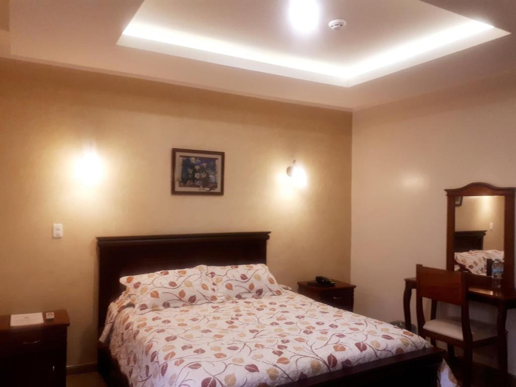 Postel nebo postele na pokoji v ubytování Hotel Casa Montero