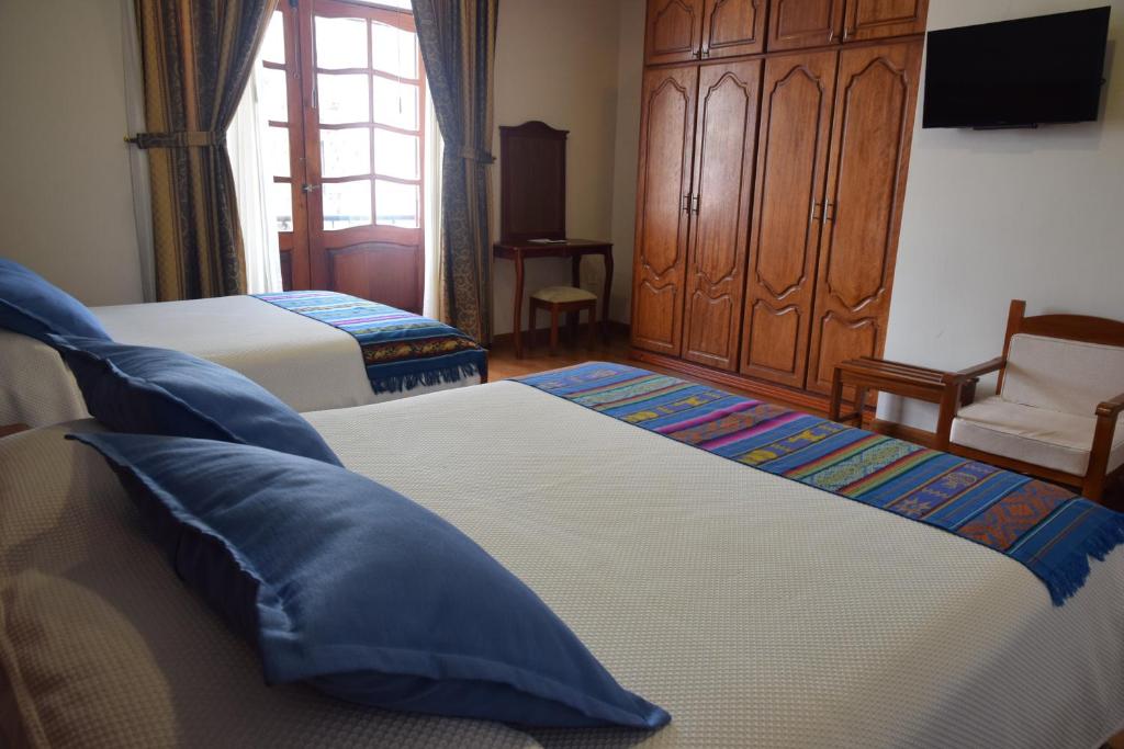Postel nebo postele na pokoji v ubytování Hotel Casa Montero