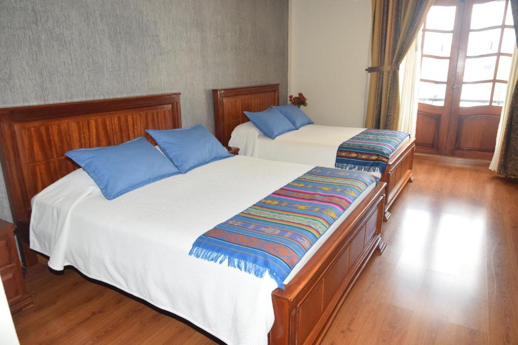 Postel nebo postele na pokoji v ubytování Hotel Casa Montero