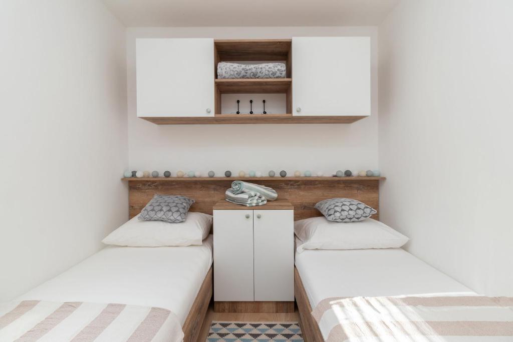 Posteľ alebo postele v izbe v ubytovaní Mobile home Sea Turtle