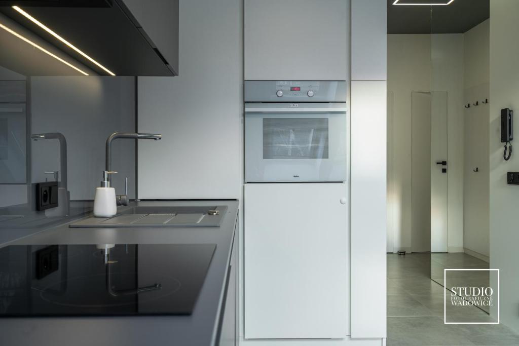Kuchyňa alebo kuchynka v ubytovaní Apartamenty Premium New