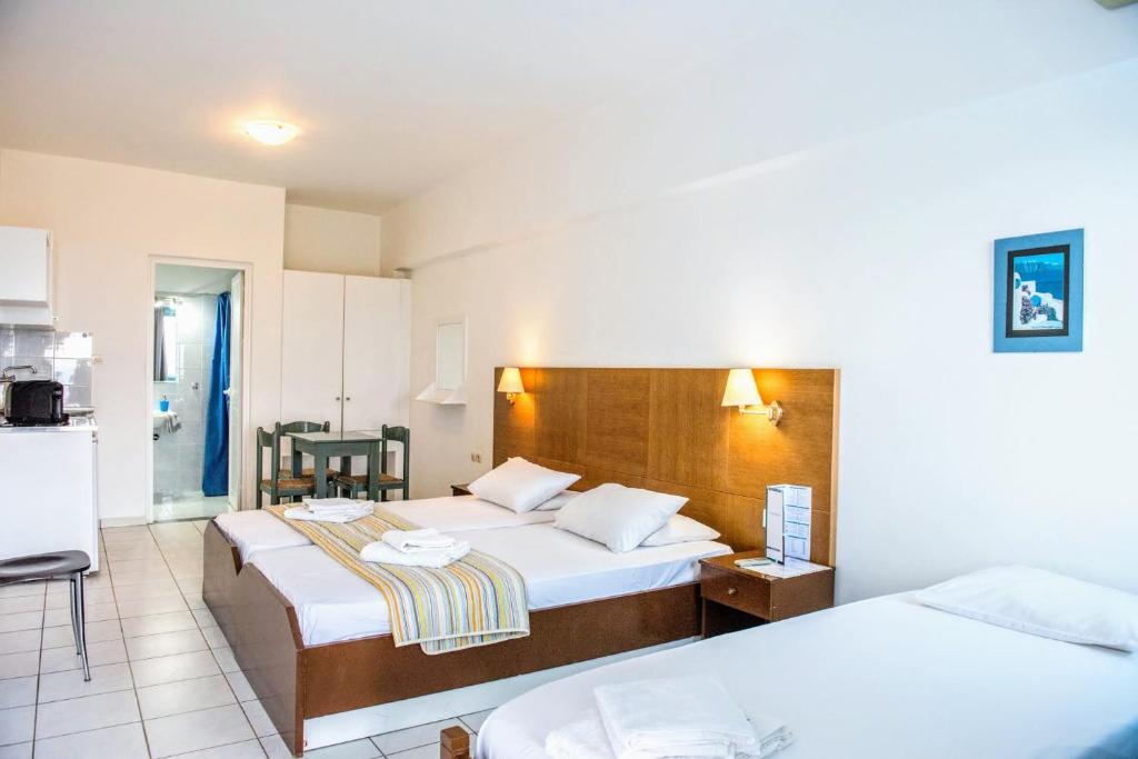 Letto o letti in una camera di Mirabella Apartments