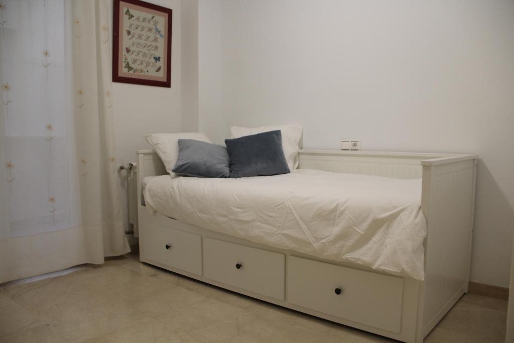 Posteľ alebo postele v izbe v ubytovaní Apartamento Iris