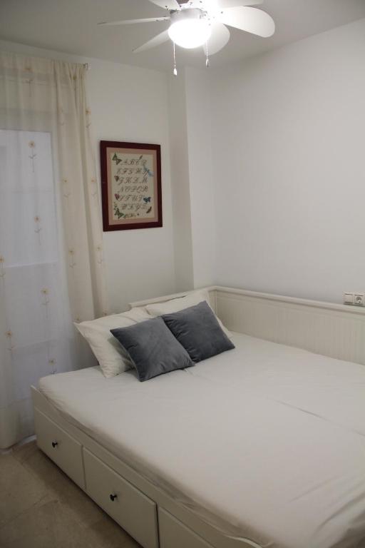 Posteľ alebo postele v izbe v ubytovaní Apartamento Iris